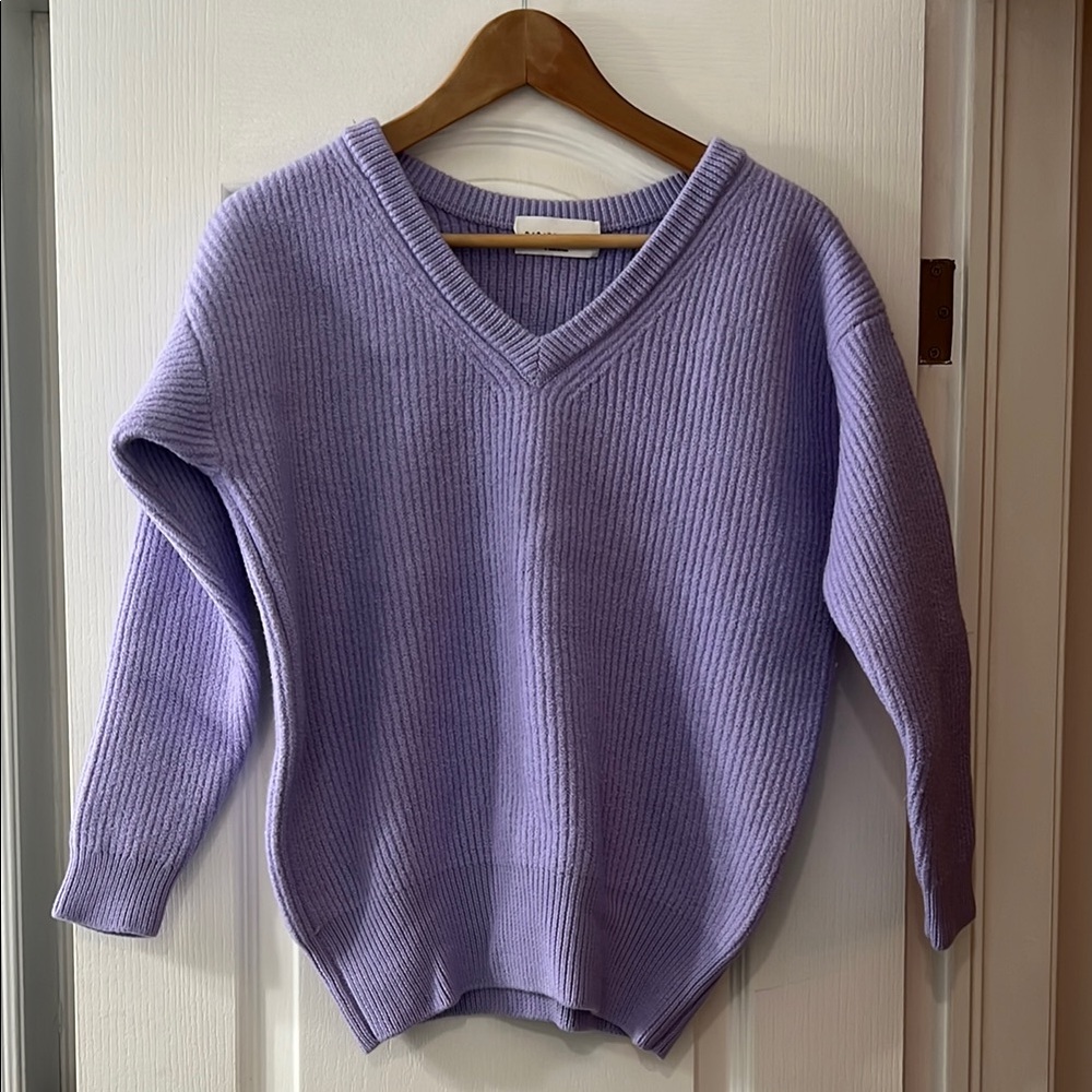 A Babaton lilac v neck sweater . Beautiful merino wool.